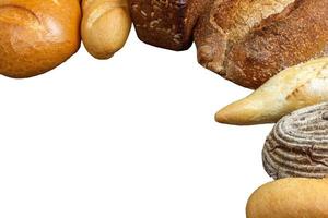 Different fresh bread, isolated on white background photo