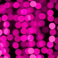 Unfocused abstract colourful bokeh purple background. defocused and blurred many round purple light photo