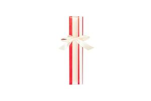 Christmas or other holiday handmade present in red paper with gold ribbon. Isolated on white background, top view. thanksgiving Gift box concept photo