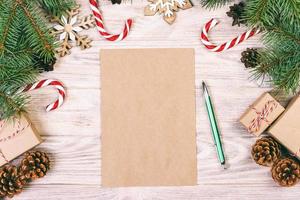 Christmas background. Gift boxes, candy cane, snowflakes and letter Top view. Toned photo