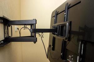 TV bracket LED display. Swivel bracket for TV. photo