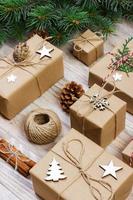 Christmas composition. christmas gifts with pine branches and christmas decoration on white background. Flat lay, top view, copy space photo