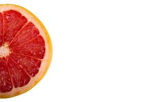 slice of grapefruit isolated on white background photo