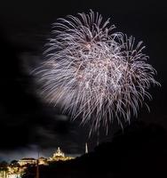 fireworks celebration in the dark sky photo