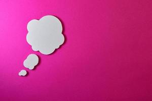 cloud text bubble on pink background photo