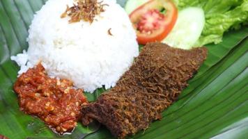 tripe food on banana leaf with classic and traditional theme photo