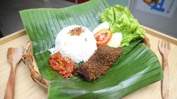 tripe food on banana leaf with classic and traditional theme photo