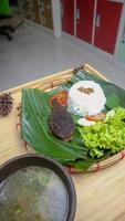 spleen food on a banana leaf with a classic and traditional theme photo