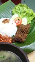 tripe food on banana leaf with classic and traditional theme photo