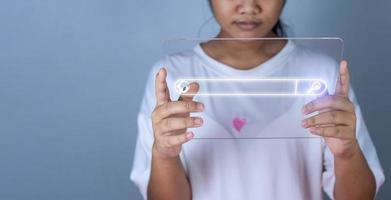 The concept of searching for information from the phone's network. with the tablet placed on the lid of the person's hand. photo