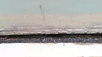front view Cracked old concrete building broken wall at the outside line cement below. effect with earthquake video