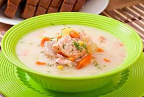 Finnish creamy soup with salmon photo
