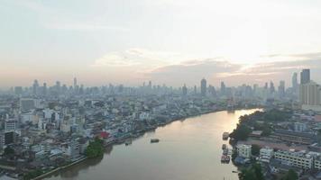 Aerial view of Bangkok city on the Chaophraya River at sunrise scene, Thailand business capital