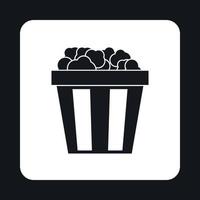 Popcorn in striped bucket icon, simple style vector