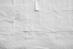 white crumpled and creased paper poster texture background photo