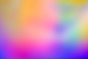 Abstract blur holographic rainbow foil iridescent background photo