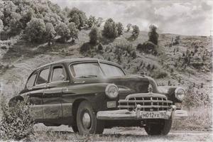 Samara, Russia, 2016-08-06, Old car ZIM on the background of the mountain. ZIM is a rare car. photo