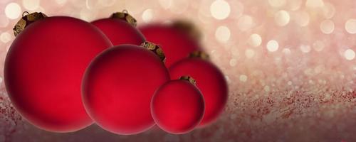 Christmas banner. Red balls on a shiny background. Christmas, holiday, greetings. Background for advertising and business. photo