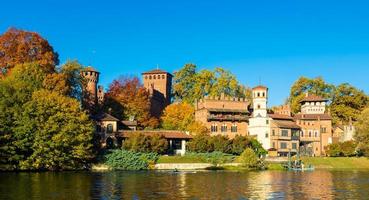 Turin, Italy - outdoors panorama with scenic Turin Valentino castle at sunrise in autumn photo