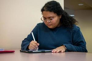 Student Studying in the Library photo