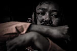 Hands of men desperate to catch the iron prison,prisoner concept,thailand people,Hope to be free. photo