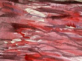 Red watercolor background with brush strokes, streaks, underlinings photo