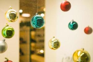 Christmas balls decoration in shopping mall - holidays and xmas decorating concept photo