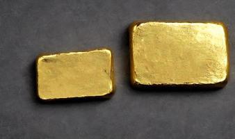 Gold ingots. Stack of gold bars, Financial concepts. photo