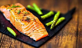 Grilled salmon. Healthy food baked salmon. Hot fish dish. photo