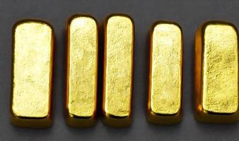 Gold ingots. Stack of gold bars, Financial concepts. photo