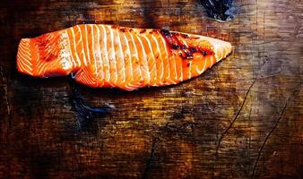 Grilled salmon. Healthy food baked salmon. Hot fish dish. photo