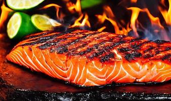 Grilled salmon. Healthy food baked salmon. Hot fish dish. photo