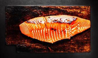 Grilled salmon. Healthy food baked salmon. Hot fish dish. photo