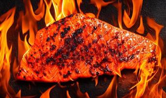 Grilled salmon. Healthy food baked salmon. Hot fish dish. photo