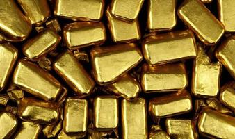 Gold ingots. Stack of gold bars, Financial concepts. photo