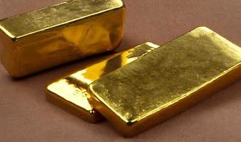 Gold ingots. Stack of gold bars, Financial concepts. photo