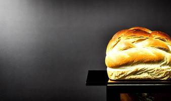 Oven - traditional fresh hot cooked bread. Bread close shooting. photo