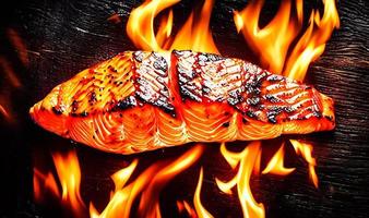 Grilled salmon. Healthy food baked salmon. Hot fish dish. photo