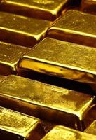 Gold ingots. Stack of gold bars, Financial concepts. photo