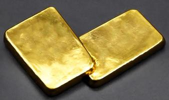 Gold ingots. Stack of gold bars, Financial concepts. photo