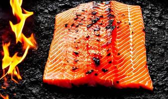 Grilled salmon. Healthy food baked salmon. Hot fish dish. photo