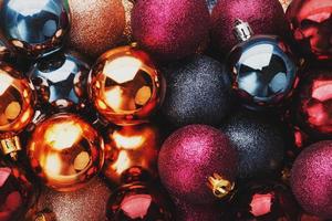 Colorful collection of Christmas Balls useful as a background patternColorful Christmas balls close up as background. photo