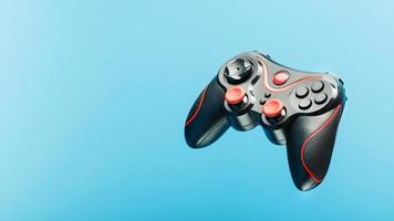 Black gamepad on a black red background, . Gaming concept. photo
