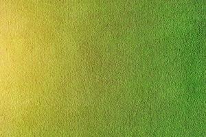 Seamless texture of artificial grass field. With sunshine photo