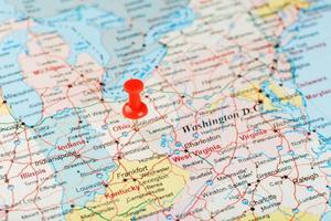 Red clerical needle on a map of USA, South Ohio and the capital Columbus. Close up map of South Ohio with red tack photo