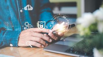 Cybersecurity Management with Online Authentication Technology Businessmen use smart phone log in with encryption,and through authorization and authentication from the database,verify your privacy photo
