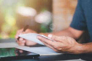 business people evaluation annual project budget, business document evaluation process Market Data Report Analysis and consulting, monitoring revenue statement of performance of the company photo