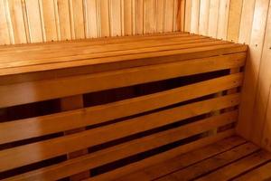 Interior details of traditional Finnish sauna steam room. Traditional old Russian bathhouse SPA Concept. Relax country village bath concept. photo