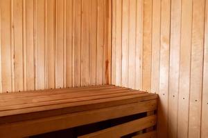 Interior details of traditional Finnish sauna steam room. Traditional old Russian bathhouse SPA Concept. Relax country village bath concept. photo