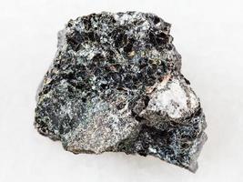 Magnetite ore on white photo